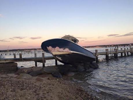 The 26-foot boat crashed ashore after its driver fell out while trying to moor the boat in Vineyard Haven.
